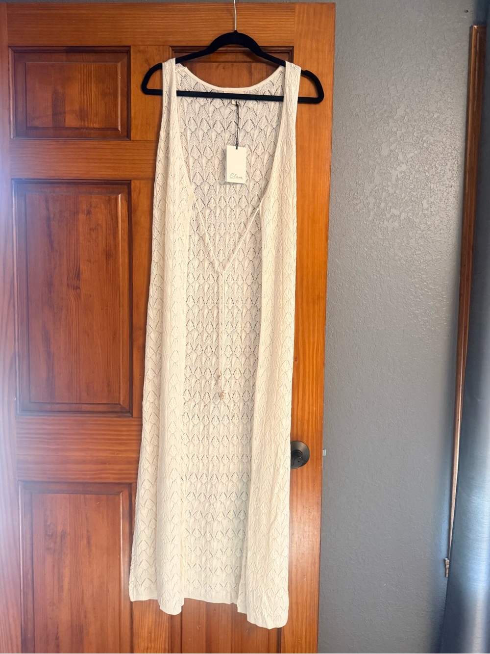 Elan Cream Openwork Knit sleeveless cardigan with Shell Tassels